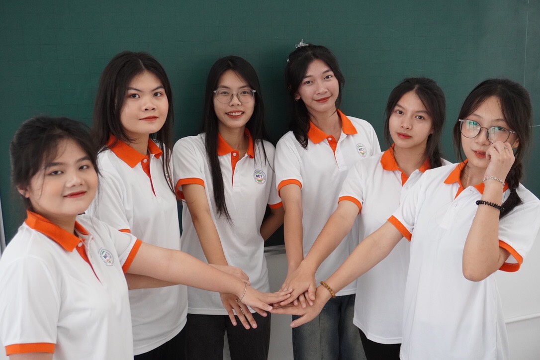 a group of women in matching outfits